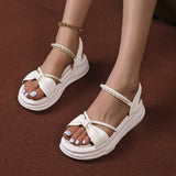 Women's slope heel thick sole sandals new waterproof platform versatile sponge cake fairy style pearl Roman shoes high heels