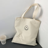 Smiling Face Canvas Tote Bag - Large Capacity, Cute, Shoulder Bag for Travelling, Shopping, Durable and Reusable Handbag